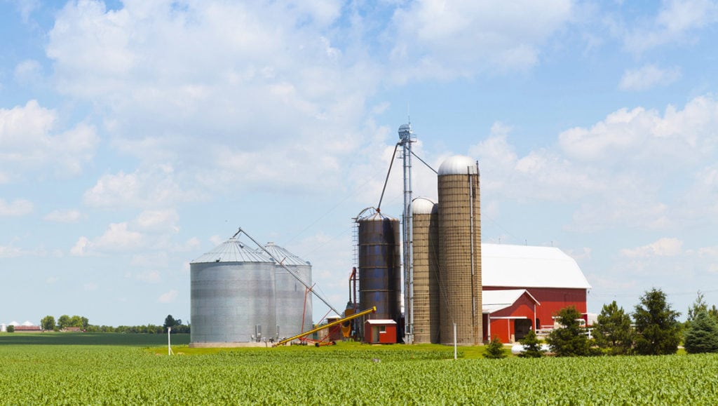 American Farmland With Blue Cloudy Sky